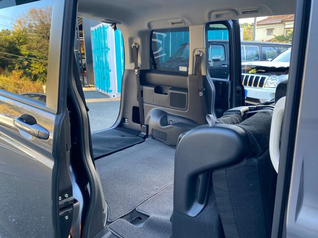 ステップワゴン Ｇ　Ｅセレクション　９インチ純正ナビ　ＢＴ　バックカメラ　後部モニター　ＥＴＣ　クルコン　盗難防止装置　スマートキー　社外アルミホイール　電動格納ミラー　両側スライド片側電動ドア　三列シート　フルフラットシート（54枚目）