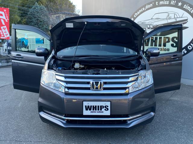 ステップワゴン Ｇ　Ｅセレクション　９インチ純正ナビ　ＢＴ　バックカメラ　後部モニター　ＥＴＣ　クルコン　盗難防止装置　スマートキー　社外アルミホイール　電動格納ミラー　両側スライド片側電動ドア　三列シート　フルフラットシート（59枚目）