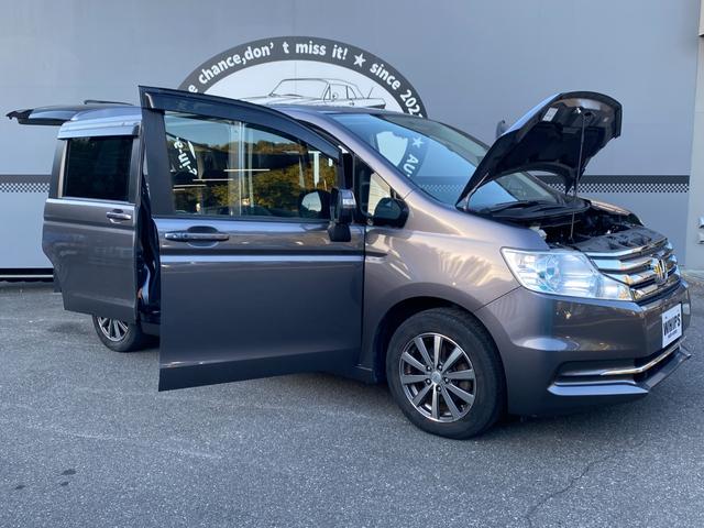 ステップワゴン Ｇ　Ｅセレクション　９インチ純正ナビ　ＢＴ　バックカメラ　後部モニター　ＥＴＣ　クルコン　盗難防止装置　スマートキー　社外アルミホイール　電動格納ミラー　両側スライド片側電動ドア　三列シート　フルフラットシート（60枚目）