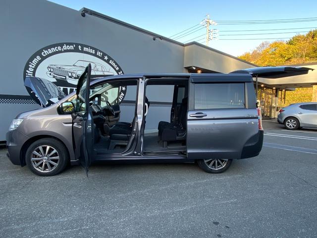 ステップワゴン Ｇ　Ｅセレクション　９インチ純正ナビ　ＢＴ　バックカメラ　後部モニター　ＥＴＣ　クルコン　盗難防止装置　スマートキー　社外アルミホイール　電動格納ミラー　両側スライド片側電動ドア　三列シート　フルフラットシート（65枚目）