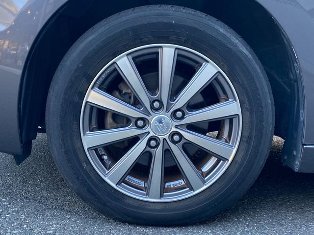 ステップワゴン Ｇ　Ｅセレクション　９インチ純正ナビ　ＢＴ　バックカメラ　後部モニター　ＥＴＣ　クルコン　盗難防止装置　スマートキー　社外アルミホイール　電動格納ミラー　両側スライド片側電動ドア　三列シート　フルフラットシート（67枚目）