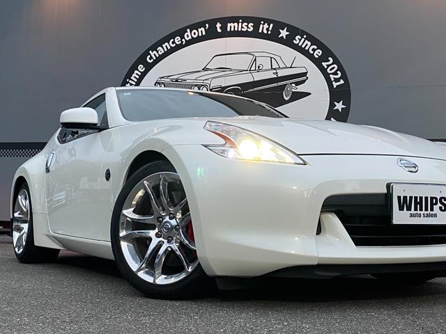 フェアレディZ 40thアニバーサリー ワンオーナー 特別仕様車 Verニスモ仕様 赤半皮電動シート 純オプAW ニスモマフラー 定期点検記録 無事故 スマートキーPスタート スペアキー ETC バックカメラ ナビ 地デジ BT リアフォグ(9枚目)