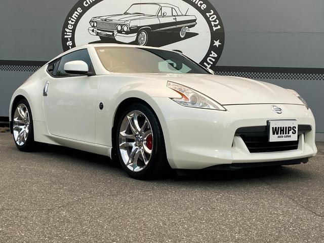 フェアレディZ 40thアニバーサリー ワンオーナー 特別仕様車 Verニスモ仕様 赤半皮電動シート 純オプAW ニスモマフラー 定期点検記録 無事故 スマートキーPスタート スペアキー ETC バックカメラ ナビ 地デジ BT リアフォグ(16枚目)