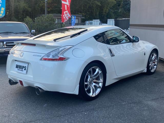 フェアレディZ 40thアニバーサリー ワンオーナー 特別仕様車 Verニスモ仕様 赤半皮電動シート 純オプAW ニスモマフラー 定期点検記録 無事故 スマートキーPスタート スペアキー ETC バックカメラ ナビ 地デジ BT リアフォグ(18枚目)