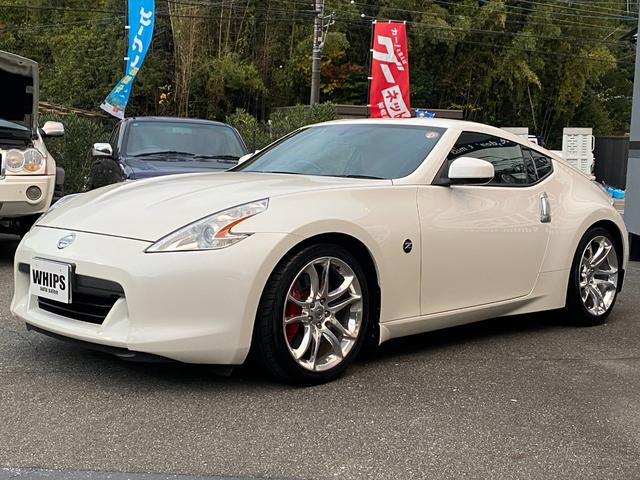 フェアレディZ 40thアニバーサリー ワンオーナー 特別仕様車 Verニスモ仕様 赤半皮電動シート 純オプAW ニスモマフラー 定期点検記録 無事故 スマートキーPスタート スペアキー ETC バックカメラ ナビ 地デジ BT リアフォグ(22枚目)