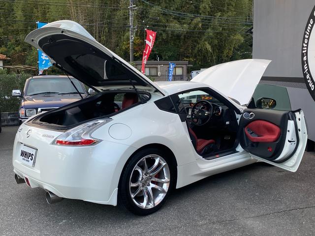 フェアレディZ 40thアニバーサリー ワンオーナー 特別仕様車 Verニスモ仕様 赤半皮電動シート 純オプAW ニスモマフラー 定期点検記録 無事故 スマートキーPスタート スペアキー ETC バックカメラ ナビ 地デジ BT リアフォグ(58枚目)