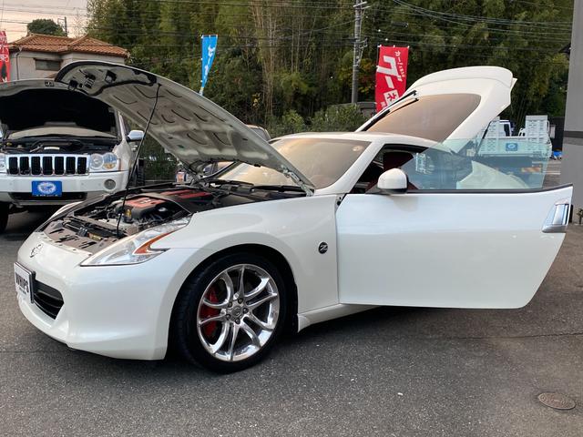 フェアレディZ 40thアニバーサリー ワンオーナー 特別仕様車 Verニスモ仕様 赤半皮電動シート 純オプAW ニスモマフラー 定期点検記録 無事故 スマートキーPスタート スペアキー ETC バックカメラ ナビ 地デジ BT リアフォグ(62枚目)