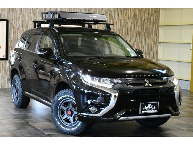 アウトランダーＰＨＥＶ Ｇセーフティパッケージ　ＰＨＥＶ　切替４ＷＤ　リフトアップ　ＷＥＤＳ１７ＡＷ　ＴＯＹＯタイヤ　　ＣＵＲＴラック　ハーフレザーシート　シートヒーター　マルチアラウンドモニター　ＥＴＣ　ＡＣ１００Ｖ１５００Ｗ給電（55枚目）