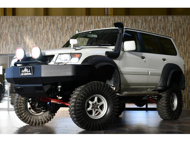 グランロードリミテッド　切替４ＷＤ　１ナンバー４人乗り　リフトアップ　ＡＲＢ作業灯　社外１６ＡＷ　マッドタイヤ　ワンオフマフラー　社外ステアリング　ＬＥＤテール　アイアンバンパー　ＥＴＣ　ＨＤＤナビ　地デジ　ＢＴ　ＤＶＤ(53枚目)