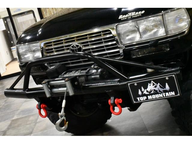 ランドクルーザー８０ アクティブバケーション　４ＷＤ　サンルーフ　シートヒーター　デフロック　４インチボディリフト　ミッキートンプソン１６インチ　マッドタイヤ　ウインチ　アイアンバンパー　リアラダー　社外オーバーフェンダー　ドラレコ（9枚目）