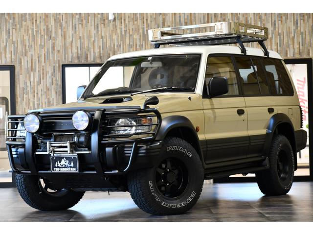 パジェロ ワイド　エクシード　切替４ＷＤ　ベージュ全塗装　サンルーフ　ルーフキャリア　アイバワークスルーフラック　グリルガード　ＥＮＫＥＩ１６インチＡＷ　リアラダー　ＰＩＡＡフロントフォグ　背面タイヤ　社外ステアリング　ＥＴＣ（25枚目）