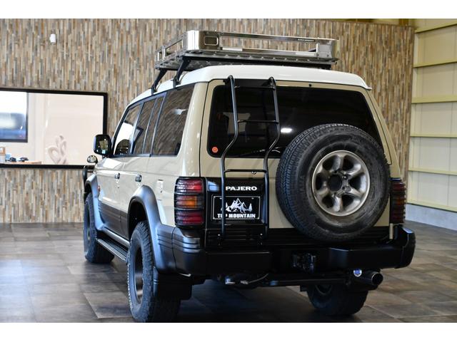 ワイド　エクシード　切替４ＷＤ　ベージュ全塗装　サンルーフ　ルーフキャリア　アイバワークスルーフラック　グリルガード　ＥＮＫＥＩ１６インチＡＷ　リアラダー　ＰＩＡＡフロントフォグ　背面タイヤ　社外ステアリング　ＥＴＣ(39枚目)