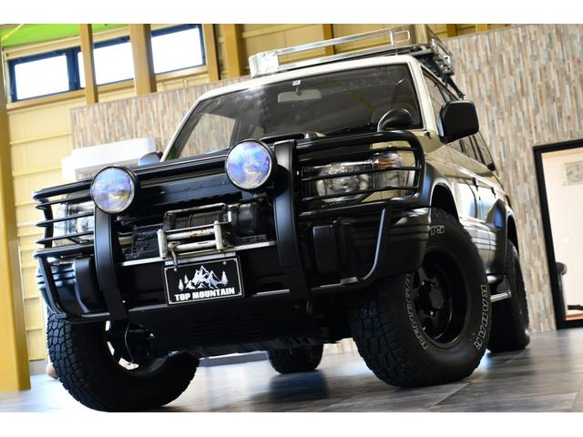 ワイド　エクシード　切替４ＷＤ　ベージュ全塗装　サンルーフ　ルーフキャリア　アイバワークスルーフラック　グリルガード　ＥＮＫＥＩ１６インチＡＷ　リアラダー　ＰＩＡＡフロントフォグ　背面タイヤ　社外ステアリング　ＥＴＣ(57枚目)