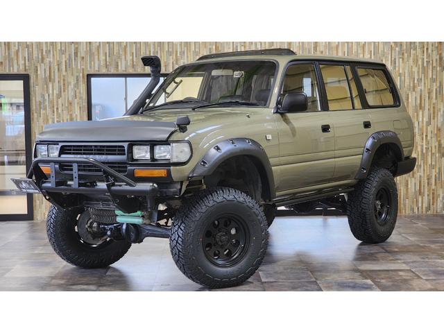 ＶＸリミテッド　４ＷＤ　サンルーフ　サンドカーキ全塗装　リフトアップ　ジムライン　ジオランダーＸ－ＡＴ　社外オーバーフェンダー　シュノーケル　角目ヘッド　バンパーガード　ＨＤＤナビ　革シート　シートヒーター　ＥＴＣ(2枚目)