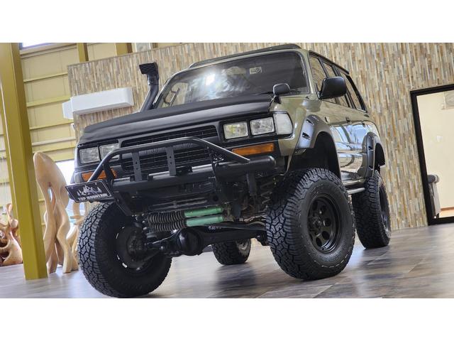 ランドクルーザー８０ ＶＸリミテッド　４ＷＤ　サンルーフ　サンドカーキ全塗装　リフトアップ　ジムライン　ジオランダーＸ－ＡＴ　社外オーバーフェンダー　シュノーケル　角目ヘッド　バンパーガード　ＨＤＤナビ　革シート　シートヒーター　ＥＴＣ（5枚目）