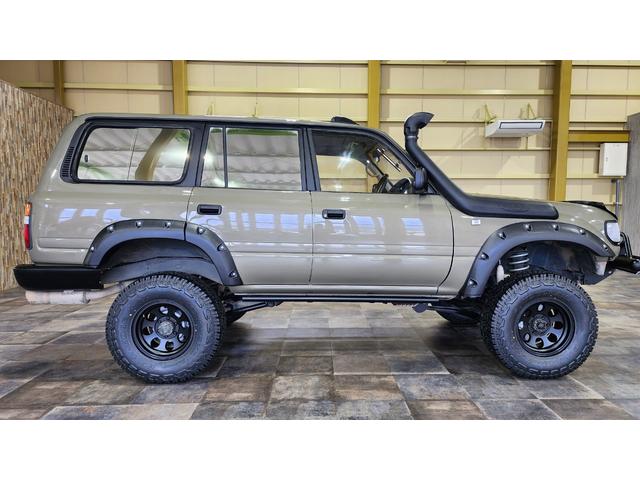 ランドクルーザー８０ ＶＸリミテッド　４ＷＤ　サンルーフ　サンドカーキ全塗装　リフトアップ　ジムライン　ジオランダーＸ－ＡＴ　社外オーバーフェンダー　シュノーケル　角目ヘッド　バンパーガード　ＨＤＤナビ　革シート　シートヒーター　ＥＴＣ（15枚目）