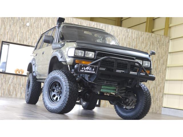 ランドクルーザー８０ ＶＸリミテッド　４ＷＤ　サンルーフ　サンドカーキ全塗装　リフトアップ　ジムライン　ジオランダーＸ－ＡＴ　社外オーバーフェンダー　シュノーケル　角目ヘッド　バンパーガード　ＨＤＤナビ　革シート　シートヒーター　ＥＴＣ（79枚目）