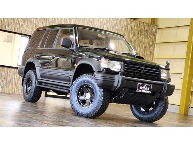 ワイド　エクシード　ディーゼルターボ　三菱ＯＰカラーエメラルドブラックパール全塗装済み　切替４ＷＤ　サンルーフ　リフトアップ　ＸＪ０５－１６インチ　ジオランダーＸ－ＡＴ　ダブルエアコン　キーレス　電格ミラー　ＥＴＣ(54枚目)