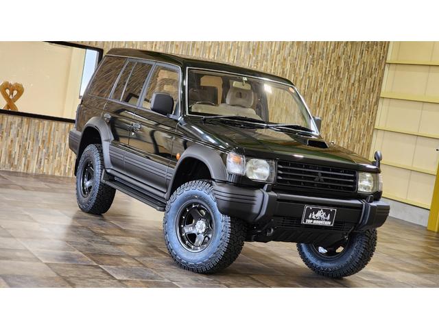 ワイド　エクシード　ディーゼルターボ　三菱ＯＰカラーエメラルドブラックパール全塗装済み　切替４ＷＤ　サンルーフ　リフトアップ　ＸＪ０５－１６インチ　ジオランダーＸ－ＡＴ　ダブルエアコン　キーレス　電格ミラー　ＥＴＣ(59枚目)