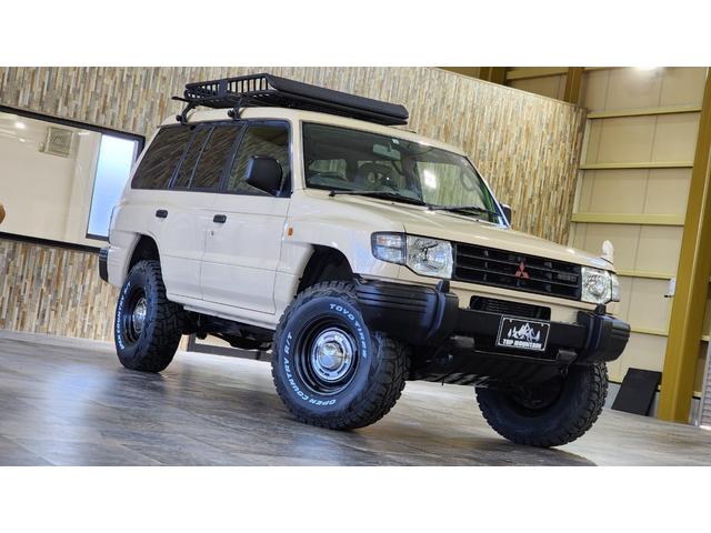 ワイド　スーパーエクシード　切替４ＷＤ　ベージュ全塗装　リフトアップ　ＤＥＡＮクロスカントリー　ヒッチメンバー　ルーフラック　背面キャリア加工　グレー革シート　シートヒーター　サンルーフ　ＥＴＣ　ＢＴオーディオ(22枚目)