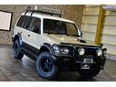 ワイド　エクシード　切替４ＷＤ　ベージュ全塗装　サンルーフ　ルーフキャリア　アイバワークスルーフラック　グリルガード　ＥＮＫＥＩ１６インチＡＷ　リアラダー　ＰＩＡＡフロントフォグ　背面タイヤ　社外ステアリング　ＥＴＣ(49枚目)