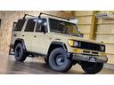 ＥＸワイド　４ＷＤ　軽油Ｔ　ベージュ全塗装　社外１６ＡＷ　ルーフキャリア　サイドオーニング　シートカバー　ＦＦヒータ　１５００Ｗ給電　冷蔵庫　ベッドキット　外部電源　走行充電　サブバッテリー　ＥＴＣ　ＳＤナビ(20枚目)