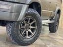 ＳＳＲ－Ｘ　ワイド　切替４ＷＤ　ワンオーナー車　２インチリフトアップ　ガンメタ全塗装済み　ＴＯＰＭＯＵＮＴＡＩＮ１７インチＡＷ　ジオランダーＸ－ＡＴ　クラシックグリル　ヴィンテージシートカバー　ＬＥＤヘッド・テール・（56枚目）