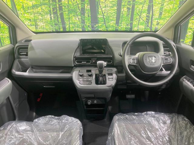 フリード クロスター 登録済未使用車 両側電動ドア 衝突被害軽減システム レーダークルーズ ハーフレザーシート コーナーセンサー スマートキー LEDヘッドライト シートヒーター オートライト オートエアコン(2枚目)