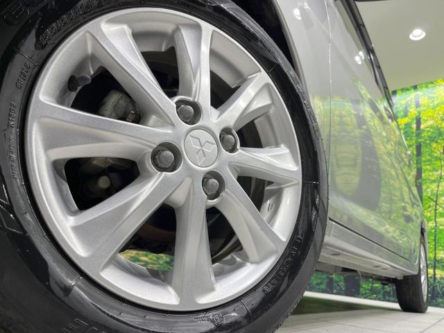 ｅＫワゴン Ｇセーフティパッケージ　全周囲カメラ　衝突被害軽減システム　禁煙車　コーナーセンサー　スマートキー　ＨＩＤヘッド　純正１４インチアルミ　車線逸脱警報　オートライト　オートエアコン　Ｂｌｕｅｔｏｏｔｈ　ＣＤ　ＤＶＤ再生（13枚目）