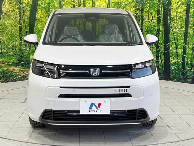 フリード エアー EX 登録済未使用車 衝突被害軽減システム コーナーセンサー スマートキー LEDヘッド 純正15インチアルミ オートハイビーム オートライト オートエアコン(15枚目)