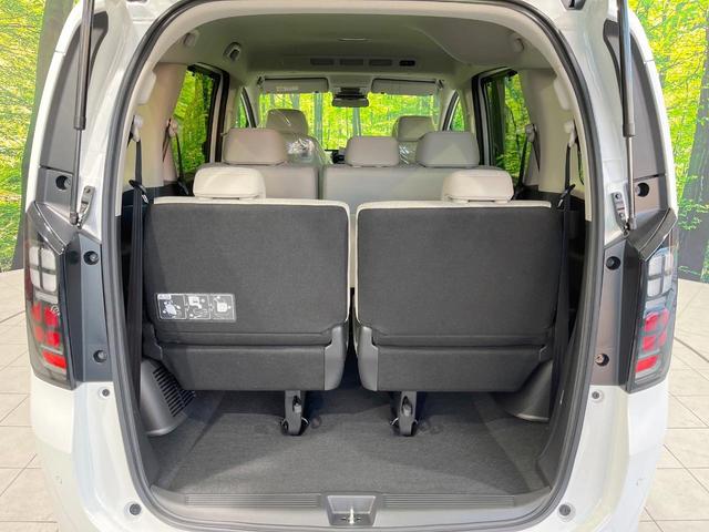 フリード エアー EX 登録済未使用車 衝突被害軽減システム コーナーセンサー スマートキー LEDヘッド 純正15インチアルミ オートハイビーム オートライト オートエアコン(33枚目)