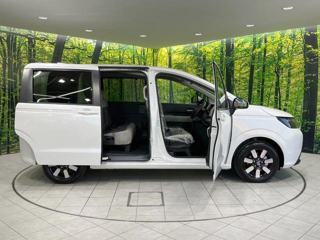 フリード エアー EX 登録済未使用車 衝突被害軽減システム コーナーセンサー スマートキー LEDヘッド 純正15インチアルミ オートハイビーム オートライト オートエアコン(44枚目)