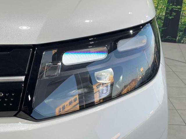 フリード エアー EX 登録済未使用車 衝突被害軽減システム コーナーセンサー スマートキー LEDヘッド 純正15インチアルミ オートハイビーム オートライト オートエアコン(46枚目)