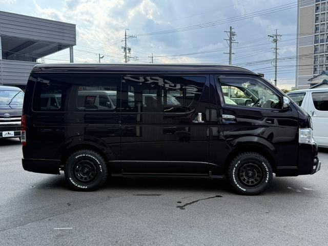 ハイエースバン ロングワイドスーパーＧＬ　４ＷＤ／寒冷地仕様／１６インチアルミホイール／バッドフェイスボンネット／フロントエアロ／シートカバー／パナソニックナビ／フルセグＴＶ／両側小窓付きスライドドア／衝突軽減ブレーキ／ＥＴＣ（18枚目）