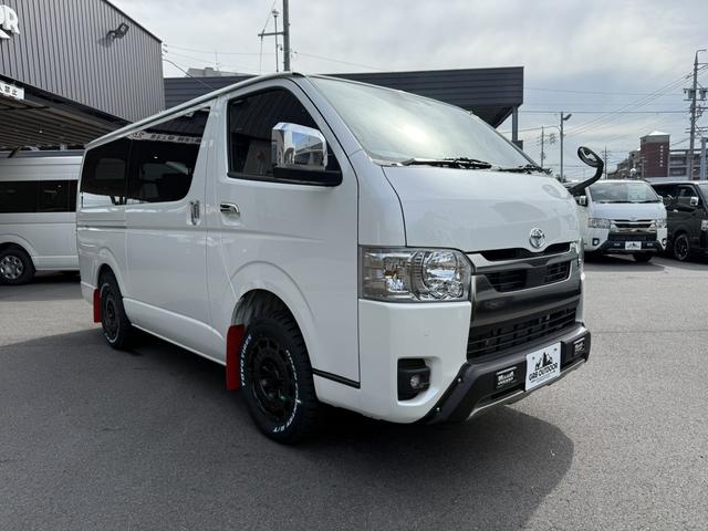 ハイエースバン ロングスーパーGL ダークプライムS 新車未登録/4WD/20周年記念/16インチアルミ/アルパインディスプレイオーディオ/ベッドキット/床張りキット/フロントエアロ/GRマッドフラップ/両側電動スライドドア/キャンピングカー(12枚目)