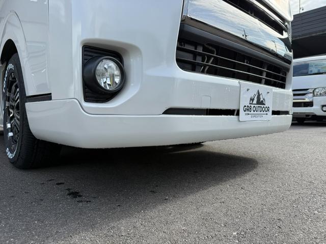 ハイエースバン スーパーGL ダークプライム 16インチアルミ/アルパインBIG-X/後席モニター/BOXベッドキット/フロントエアロ/バッドフェイスボンネット/社外センターコンソール/両側電動スライドドア/社外テールランプ/キャンピングカー(22枚目)