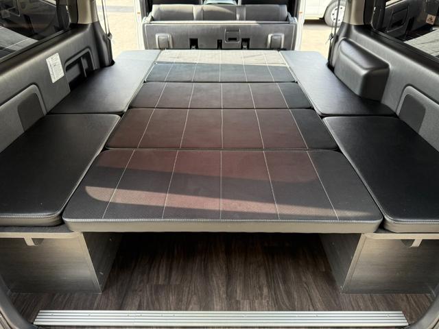 ハイエースバン スーパーGL ダークプライム 16インチアルミ/アルパインBIG-X/後席モニター/BOXベッドキット/フロントエアロ/バッドフェイスボンネット/社外センターコンソール/両側電動スライドドア/社外テールランプ/キャンピングカー(53枚目)