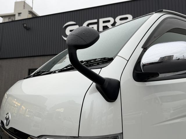 ハイエースバン スーパーGL ダークプライムII 17インチアルミ/ベッドキット/フロントエアロ/カロッツェリア後席モニター/カロッツェリア7インチナビ/シートカバー/衝突軽減ブレーキ/バックカメラ/両側小窓付きスライドドア/キャンピングカー(23枚目)