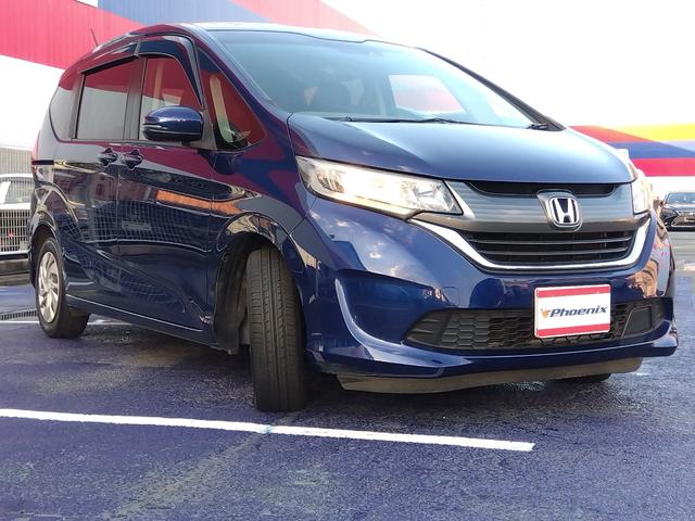 フリード G・ホンダセンシング★純正ナビフルセグTV★純正フリップダウ ンモニター★視点切替バックカメラ★両側パワースライドドア★3列6人乗り★アダプティブクルーズコントロール★ホンダセンシング★ウッドパネル★アイドリングストップ★スマートキー★プッシュスタート★(6枚目)