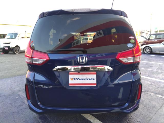 フリード G・ホンダセンシング★純正ナビフルセグTV★純正フリップダウ ンモニター★視点切替バックカメラ★両側パワースライドドア★3列6人乗り★アダプティブクルーズコントロール★ホンダセンシング★ウッドパネル★アイドリングストップ★スマートキー★プッシュスタート★(9枚目)