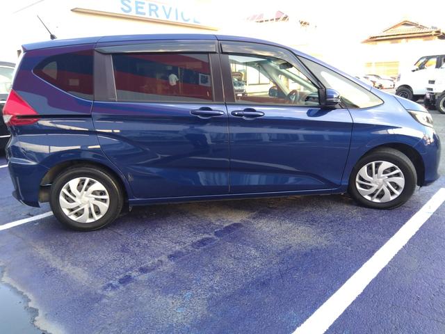 フリード G・ホンダセンシング★純正ナビフルセグTV★純正フリップダウ ンモニター★視点切替バックカメラ★両側パワースライドドア★3列6人乗り★アダプティブクルーズコントロール★ホンダセンシング★ウッドパネル★アイドリングストップ★スマートキー★プッシュスタート★(11枚目)