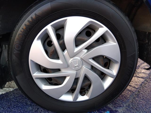 フリード G・ホンダセンシング★純正ナビフルセグTV★純正フリップダウ ンモニター★視点切替バックカメラ★両側パワースライドドア★3列6人乗り★アダプティブクルーズコントロール★ホンダセンシング★ウッドパネル★アイドリングストップ★スマートキー★プッシュスタート★(19枚目)