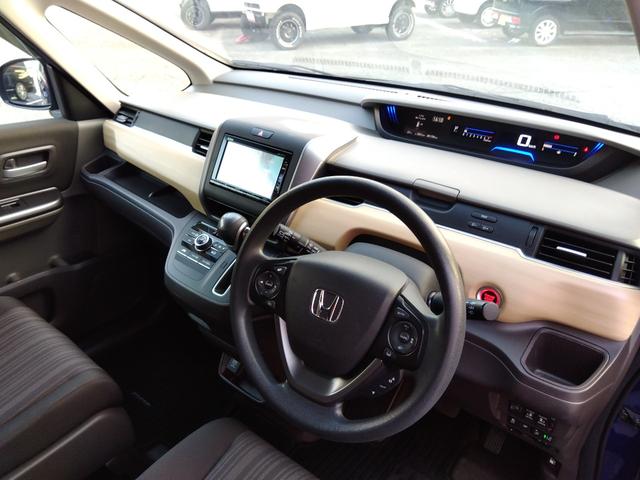 フリード G・ホンダセンシング★純正ナビフルセグTV★純正フリップダウ ンモニター★視点切替バックカメラ★両側パワースライドドア★3列6人乗り★アダプティブクルーズコントロール★ホンダセンシング★ウッドパネル★アイドリングストップ★スマートキー★プッシュスタート★(31枚目)