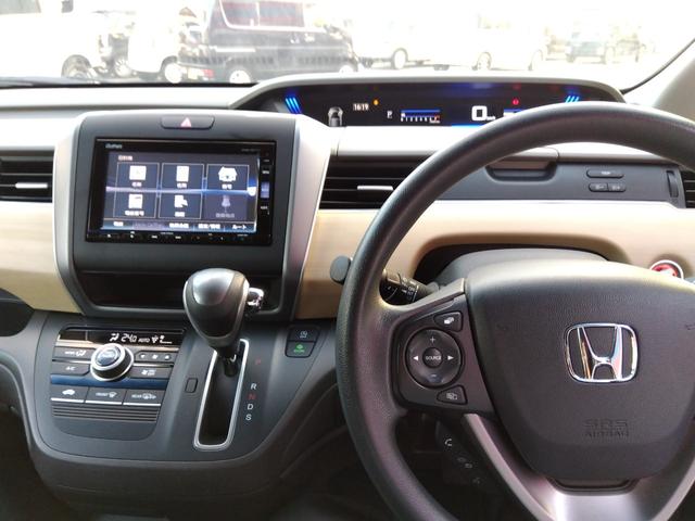 フリード G・ホンダセンシング★純正ナビフルセグTV★純正フリップダウ ンモニター★視点切替バックカメラ★両側パワースライドドア★3列6人乗り★アダプティブクルーズコントロール★ホンダセンシング★ウッドパネル★アイドリングストップ★スマートキー★プッシュスタート★(62枚目)