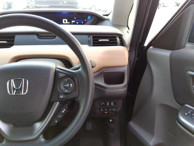 フリード G・ホンダセンシング★純正ナビフルセグTV★純正フリップダウ ンモニター★視点切替バックカメラ★両側パワースライドドア★3列6人乗り★アダプティブクルーズコントロール★ホンダセンシング★ウッドパネル★アイドリングストップ★スマートキー★プッシュスタート★(63枚目)