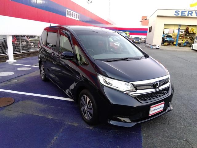 フリードハイブリッド ハイブリッド・Ｇホンダセンシング★純正ナビフルセグＴＶ★　バックカメラ★ステアリングリモコン★革巻ステアリング★レーダークルーズ★ハーフレザーシート★両側パワースライドドア★ナビ連動前後ドラレコ★ビルトインＥＴＣ★ＬＥＤオートライト★アイドリングストップ★（6枚目）