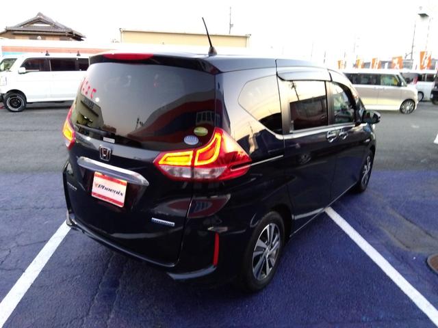 フリードハイブリッド ハイブリッド・Ｇホンダセンシング★純正ナビフルセグＴＶ★　バックカメラ★ステアリングリモコン★革巻ステアリング★レーダークルーズ★ハーフレザーシート★両側パワースライドドア★ナビ連動前後ドラレコ★ビルトインＥＴＣ★ＬＥＤオートライト★アイドリングストップ★（10枚目）