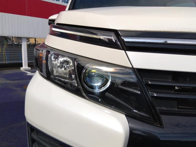 ヴォクシー ＺＳ★純正ナビ★フルセグＴＶ★純正フリップダウンモニター★　バックカメラ★ステアリングリモコン★両側パワースライドドア★ＭＴモード★７人乗り★革巻ステアリング★ロールサンシェード★オート格納ミラー★スマートキー★プッシュスタート★ＣＤ，ＤＶＤ再生★ラジオ★（12枚目）