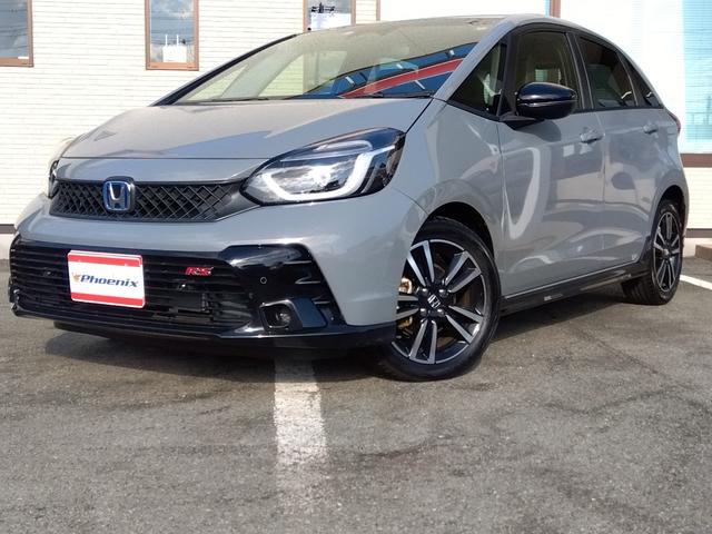 フィット ｅ：ＨＥＶ　ＲＳ★純正９インチナビフルセグＴＶ★ホンダセンシ　ング★ＬＥＤオートライト★パドルシフト★ＳＯＳコール★革巻ステアリング★４輪ディスクブレーキ★ＲＳ専用エクステリア★アームレストコンソール★レーダークルーズコントロール★ビルトインＥＴＣ２．０★（4枚目）