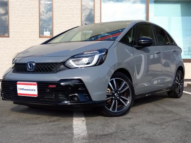 フィット ｅ：ＨＥＶ　ＲＳ★純正９インチナビフルセグＴＶ★ホンダセンシ　ング★ＬＥＤオートライト★パドルシフト★ＳＯＳコール★革巻ステアリング★４輪ディスクブレーキ★ＲＳ専用エクステリア★アームレストコンソール★レーダークルーズコントロール★ビルトインＥＴＣ２．０★（5枚目）